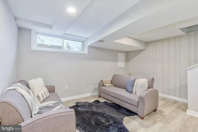 a living room with furniture and a couch