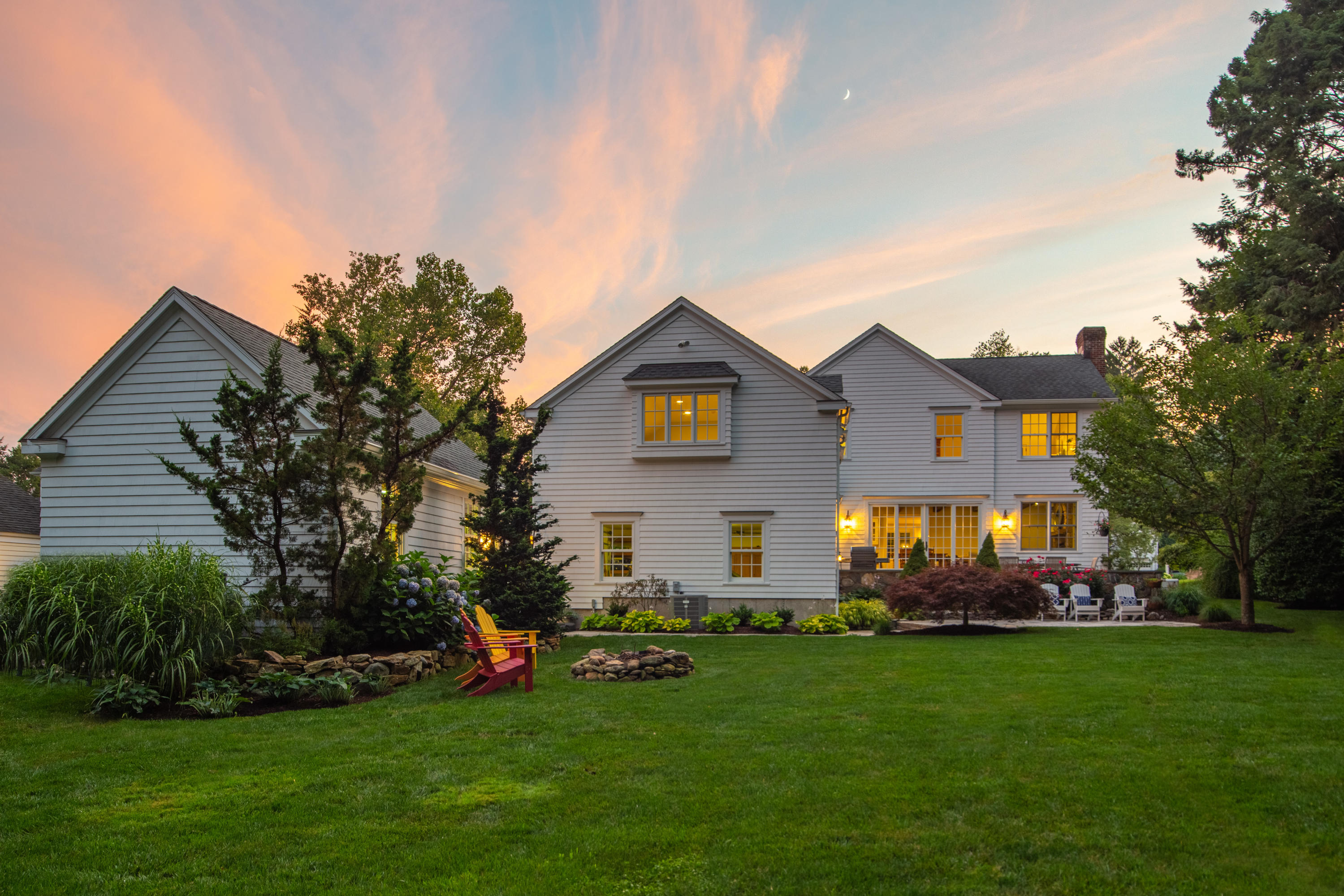 16 Birch Road Darien, CT 06820 - Photo 3 of 40 a front view of a house with a garden and trees