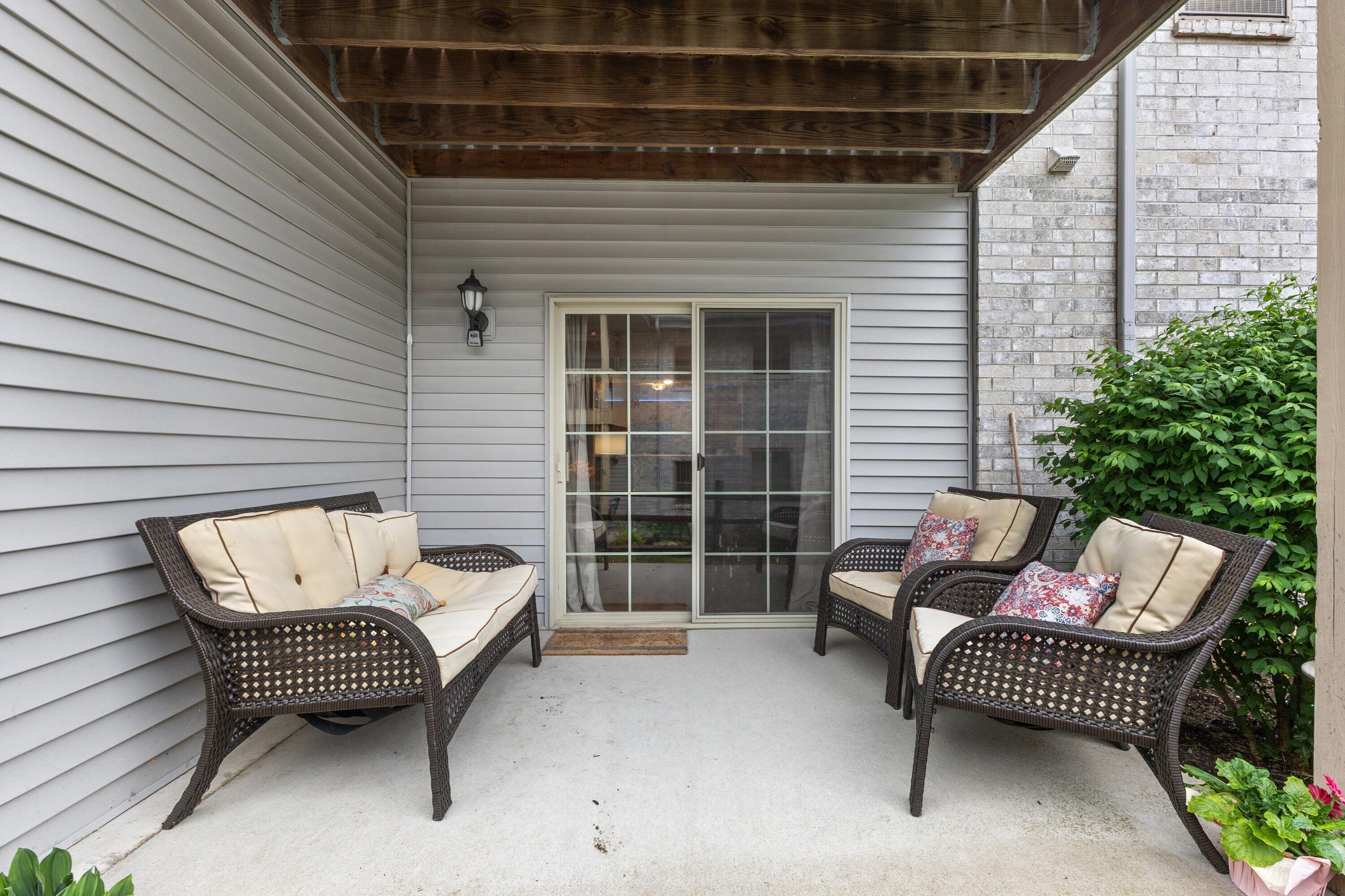 9342 West Loomis Road, Unit 8 Franklin, WI 53132 - Photo 4 of 29 large covered patio off living