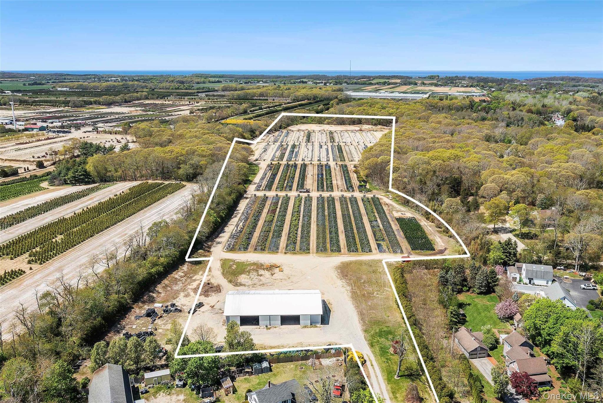 935 Franklinville Road Laurel, NY 11948 - Photo 2 of 11 Bird's eye view featuring a rural view