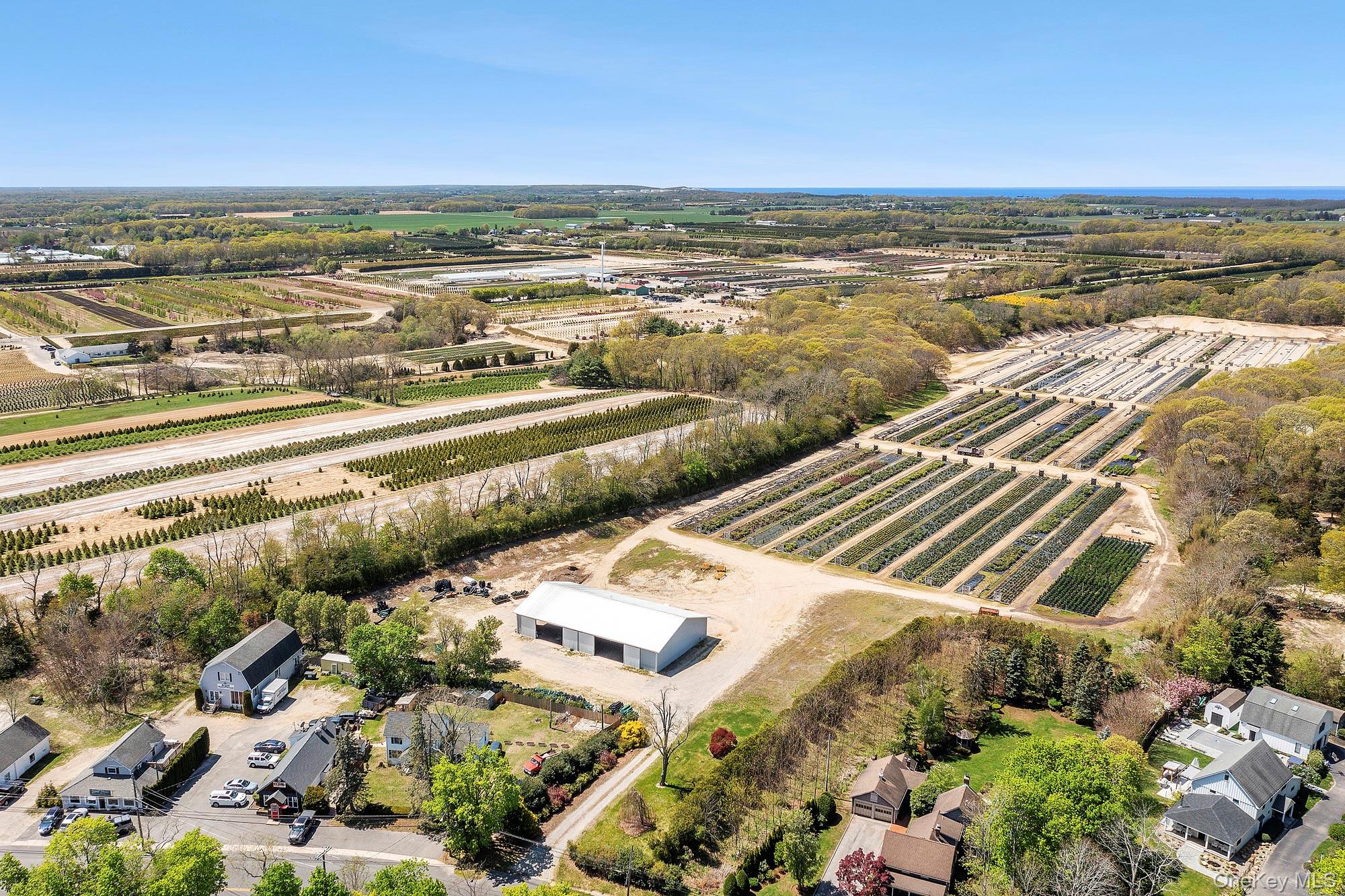 935 Franklinville Road Laurel, NY 11948 - Photo 3 of 11 Drone / aerial view featuring a rural view