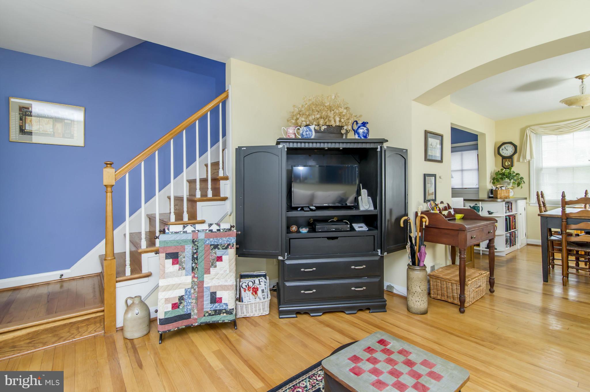 6906 Broening Road Dundalk, MD 21222 - Photo 3 of 29 a living room with furniture and a flat screen tv