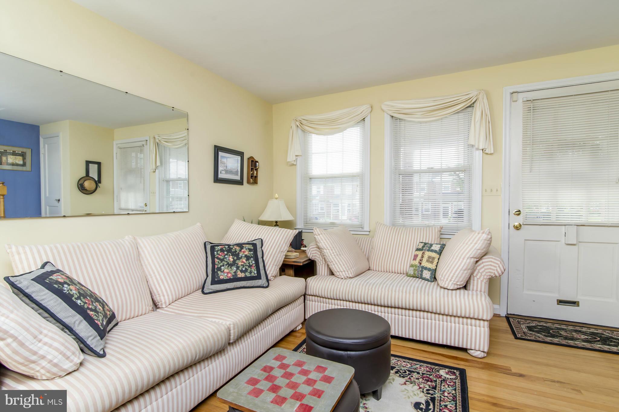 6906 Broening Road Dundalk, MD 21222 - Photo 5 of 29 a living room with furniture and a window