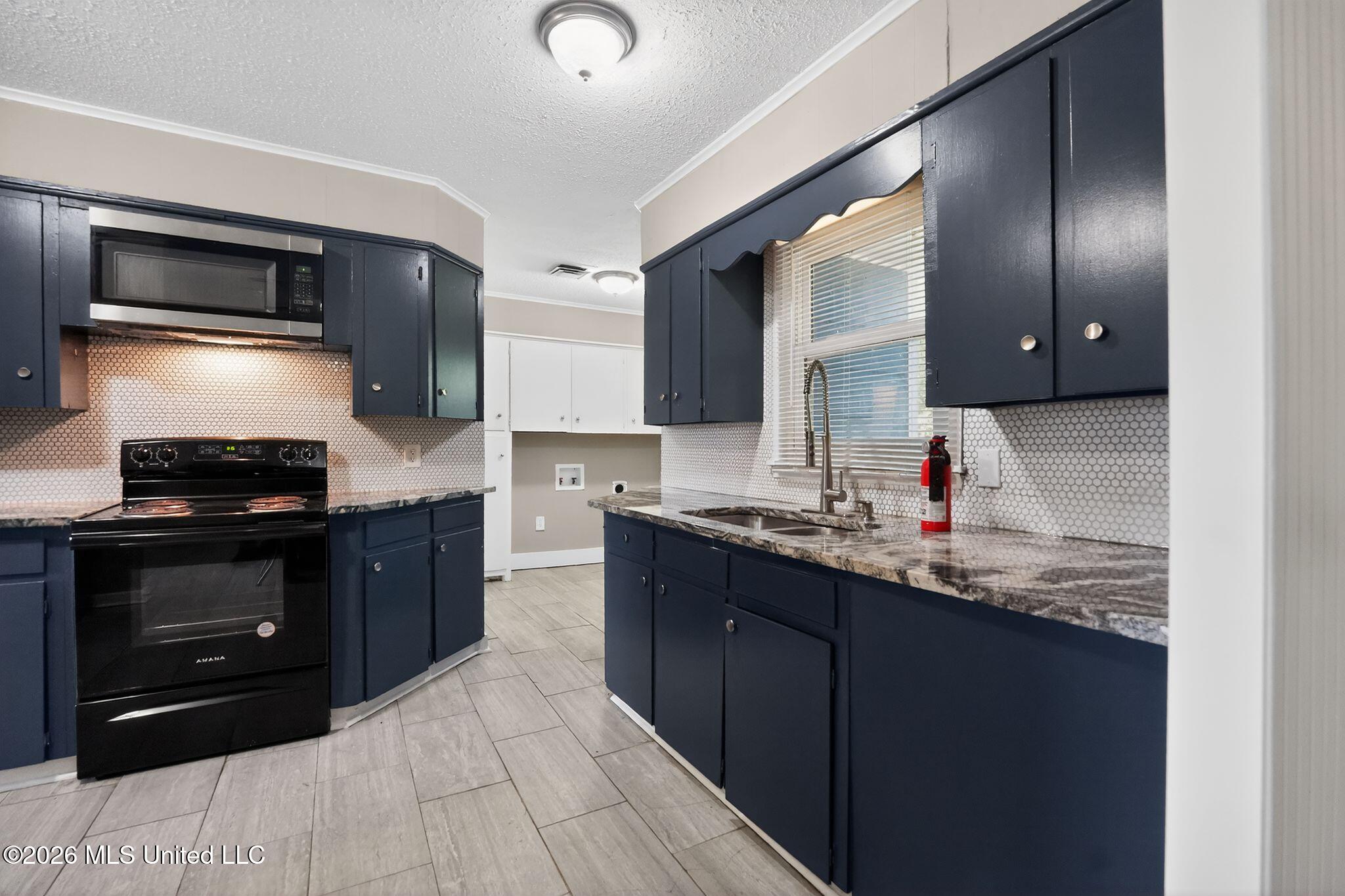 1623 Wilhurst Street Jackson, MS 39211 - Photo 16 of 41 23_1623_Wilhurst_St_Jackson_MS_39211-Kit
