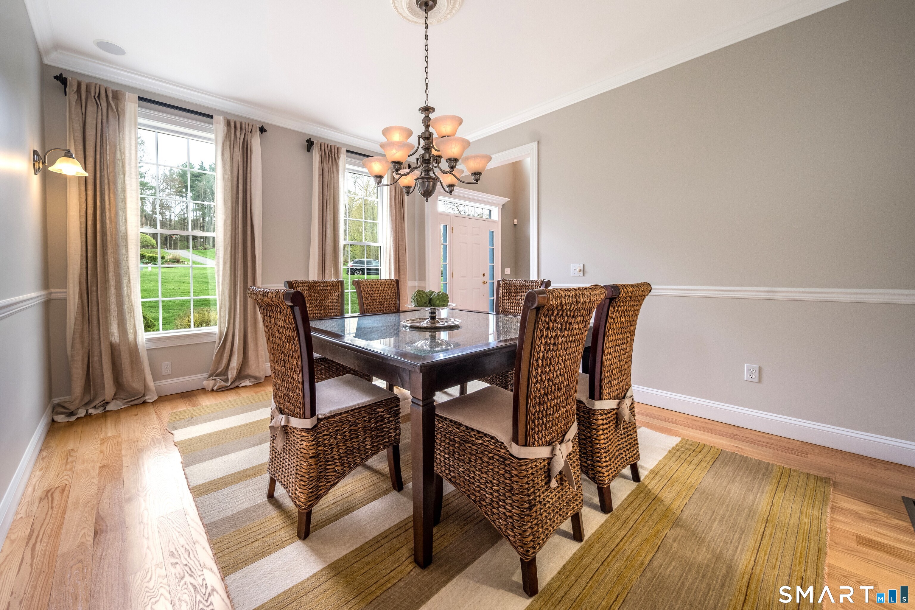4 Collins View Road Canton, CT 06019 - Photo 16 of 38 a view of a dining room with furniture window and wooden floor