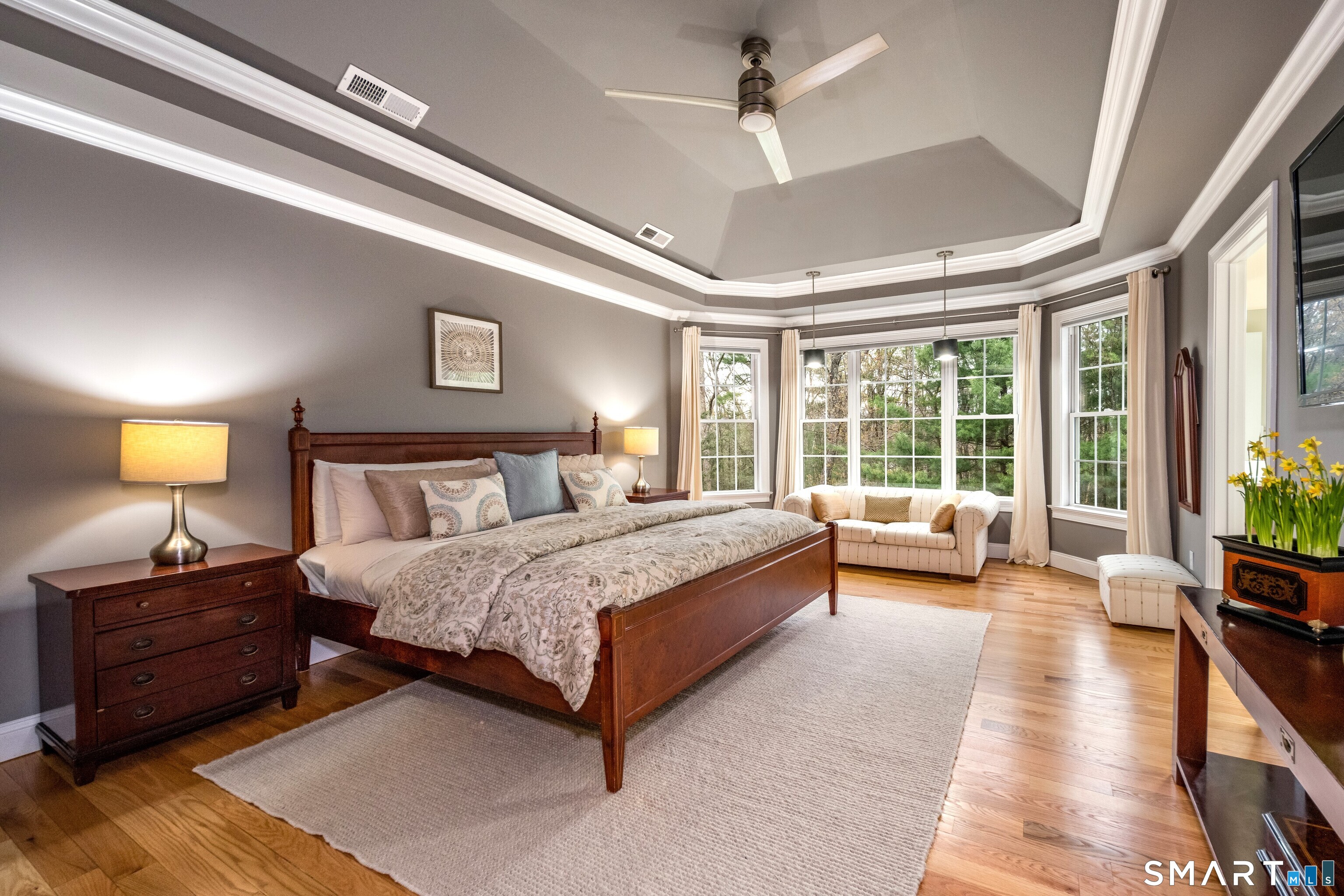 4 Collins View Road Canton, CT 06019 - Photo 19 of 38 a spacious bedroom with a bed and a couch