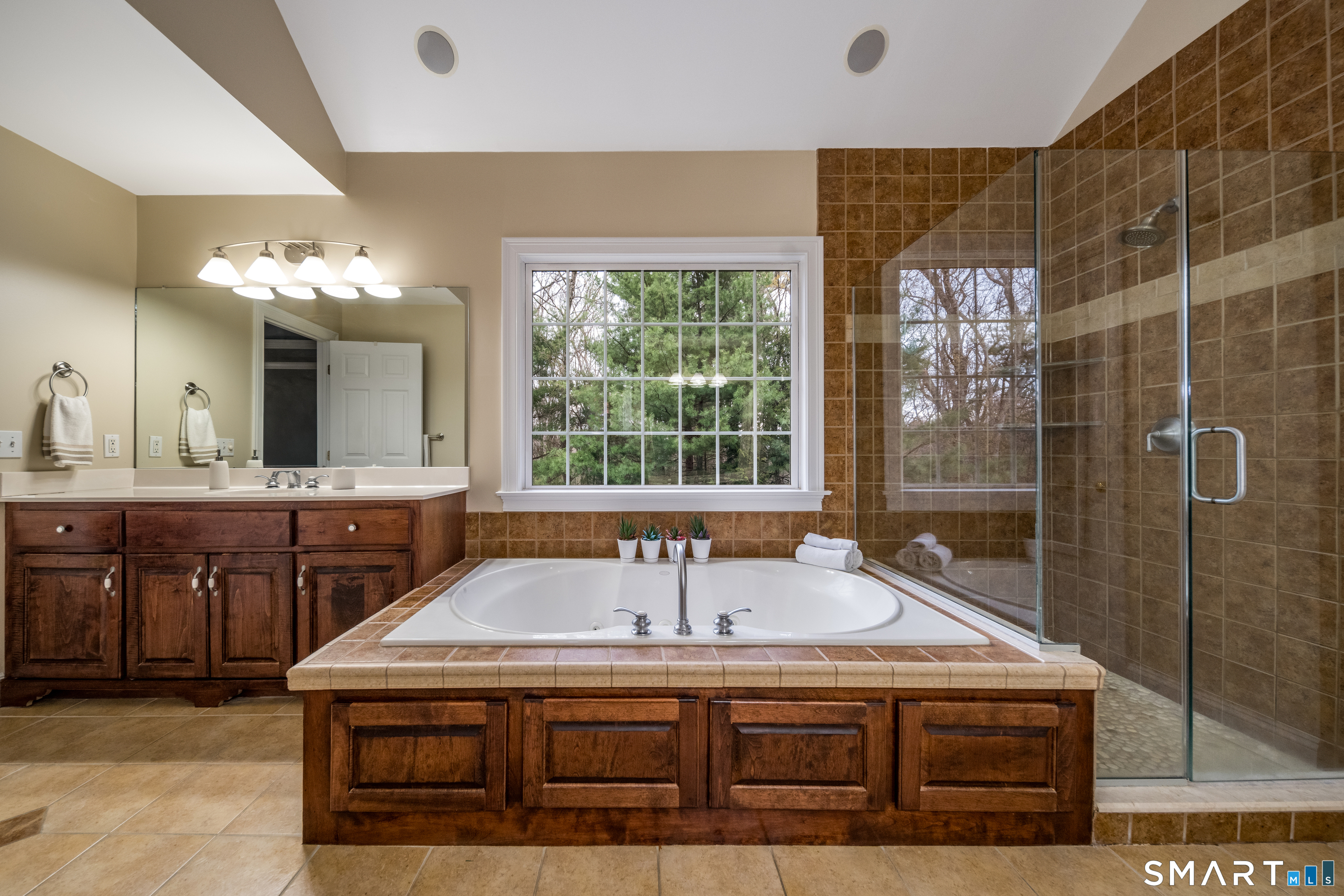 4 Collins View Road Canton, CT 06019 - Photo 21 of 38 a bathroom with a sink and a mirror