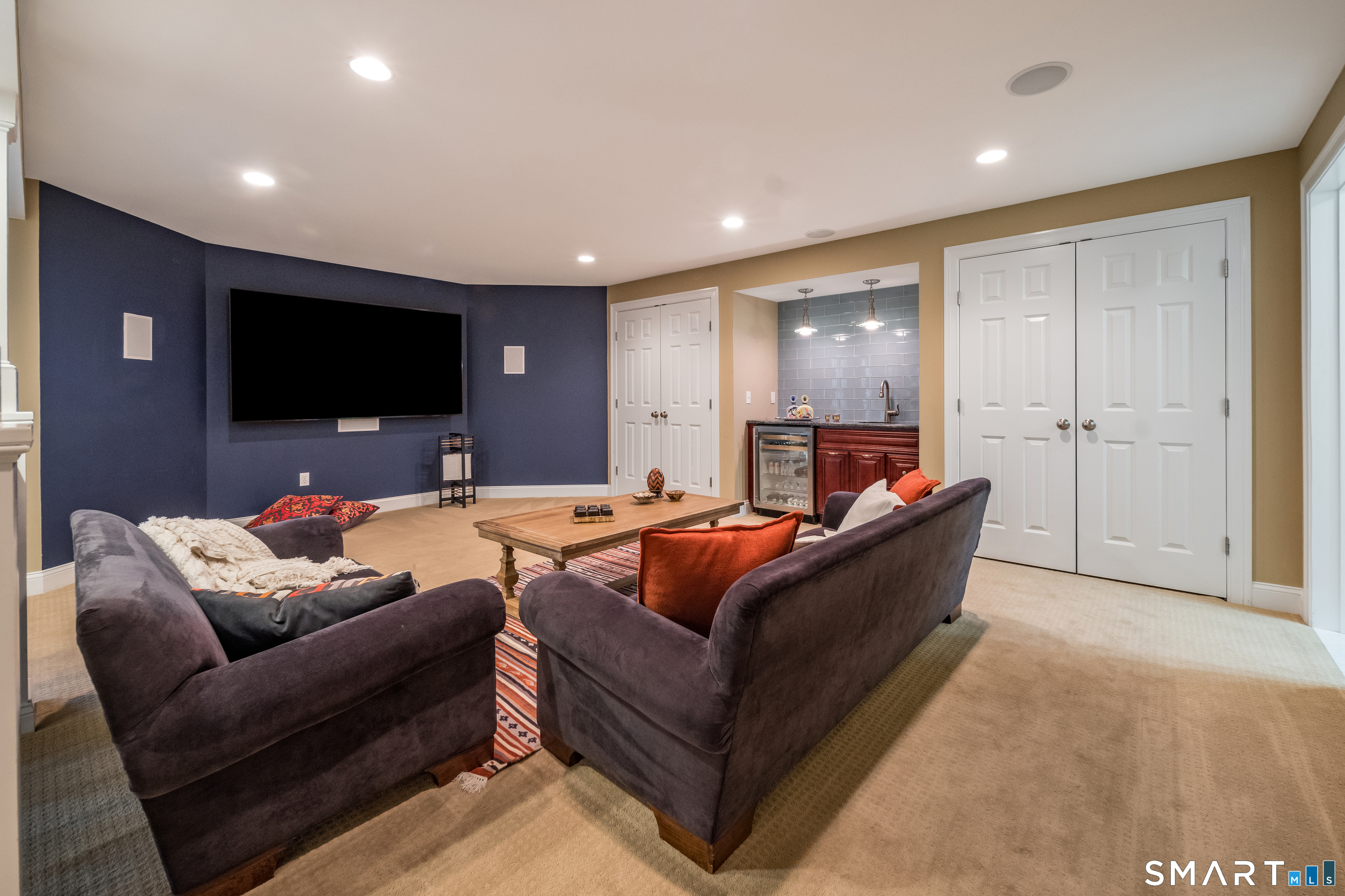 4 Collins View Road Canton, CT 06019 - Photo 29 of 38 a living room with furniture and a flat screen tv