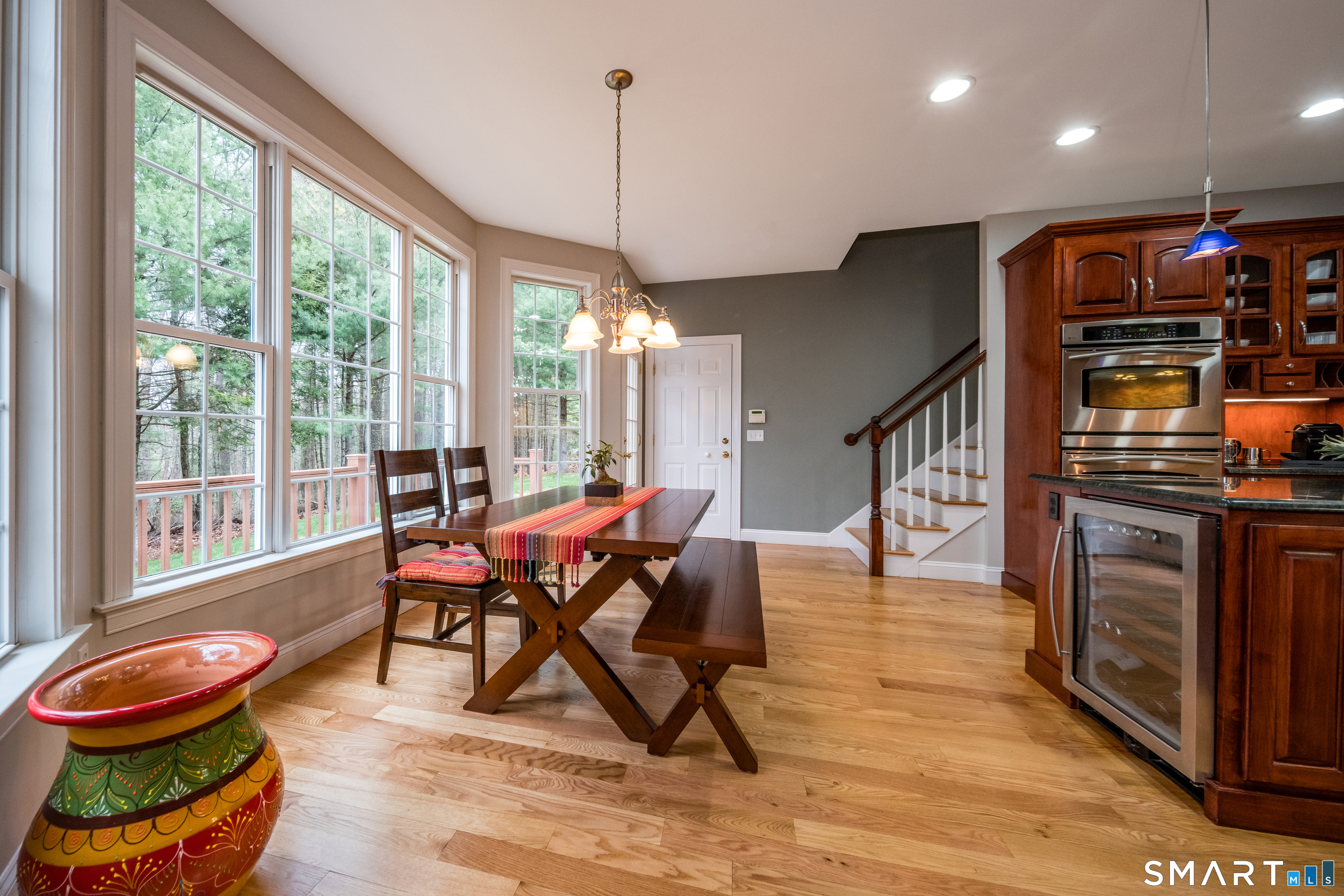 4 Collins View Road Canton, CT 06019 - Photo 9 of 38 a dining room with furniture and wooden floor