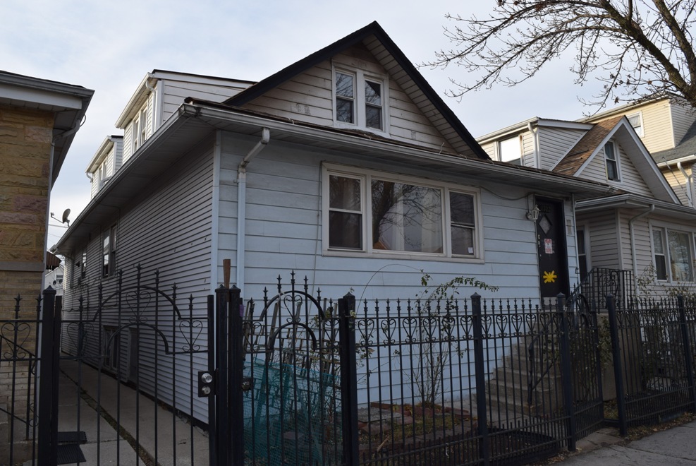 a front view of a house with a balcony