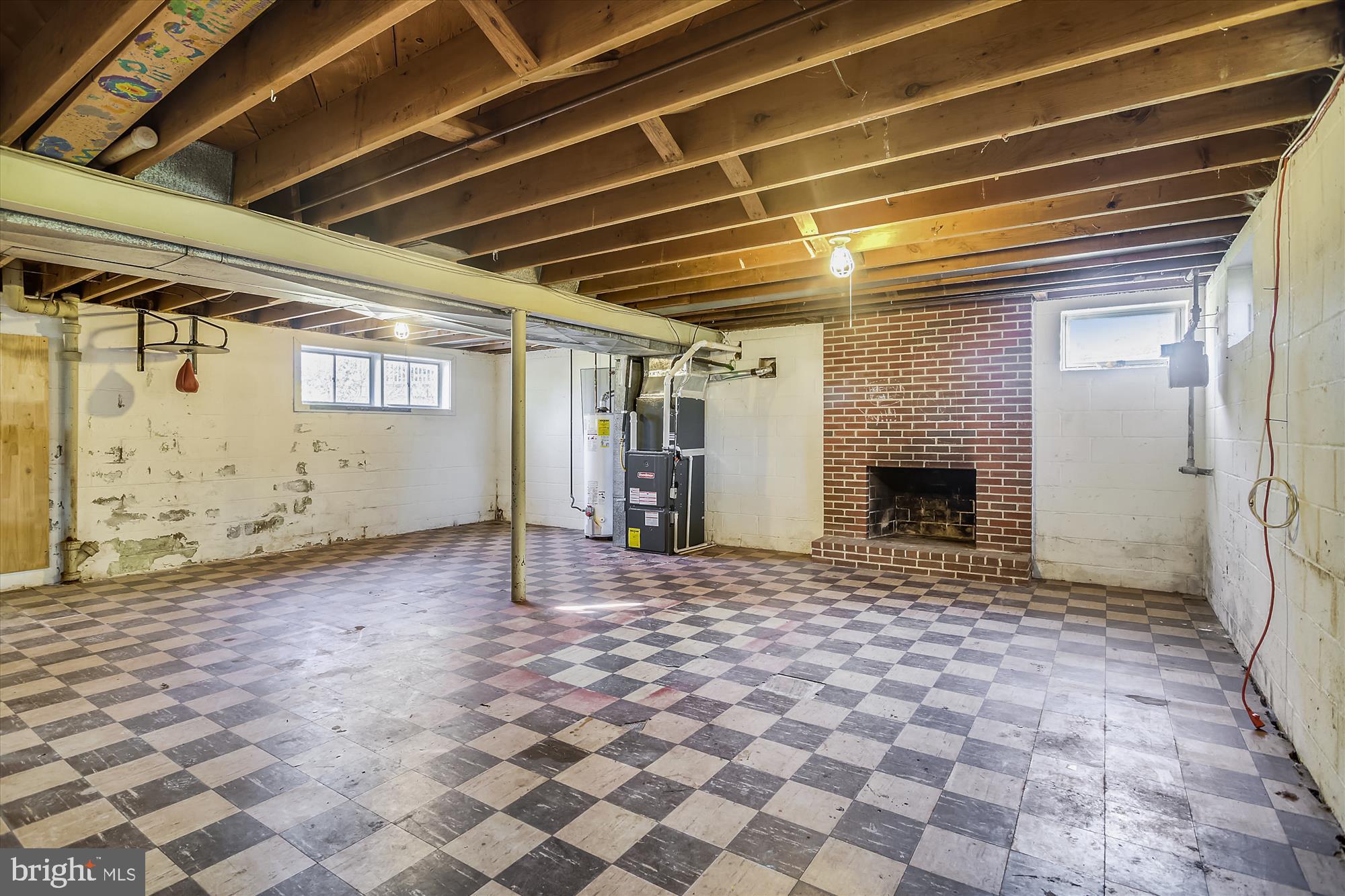 818 Stoneleigh Road Baltimore, MD 21212 - Photo 29 of 35 Full basement with wood burning fireplace