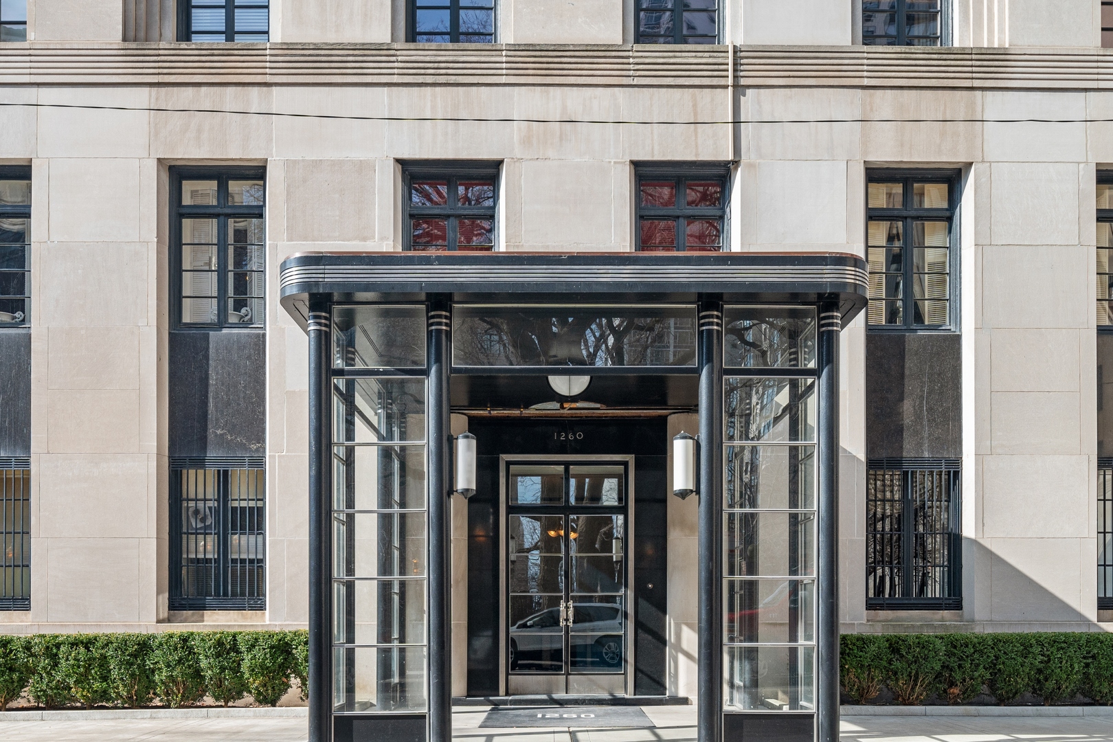 1260 North Astor Street, Unit 8 Chicago, IL 60610 - Photo 2 of 27 a front view of a house with glass windows