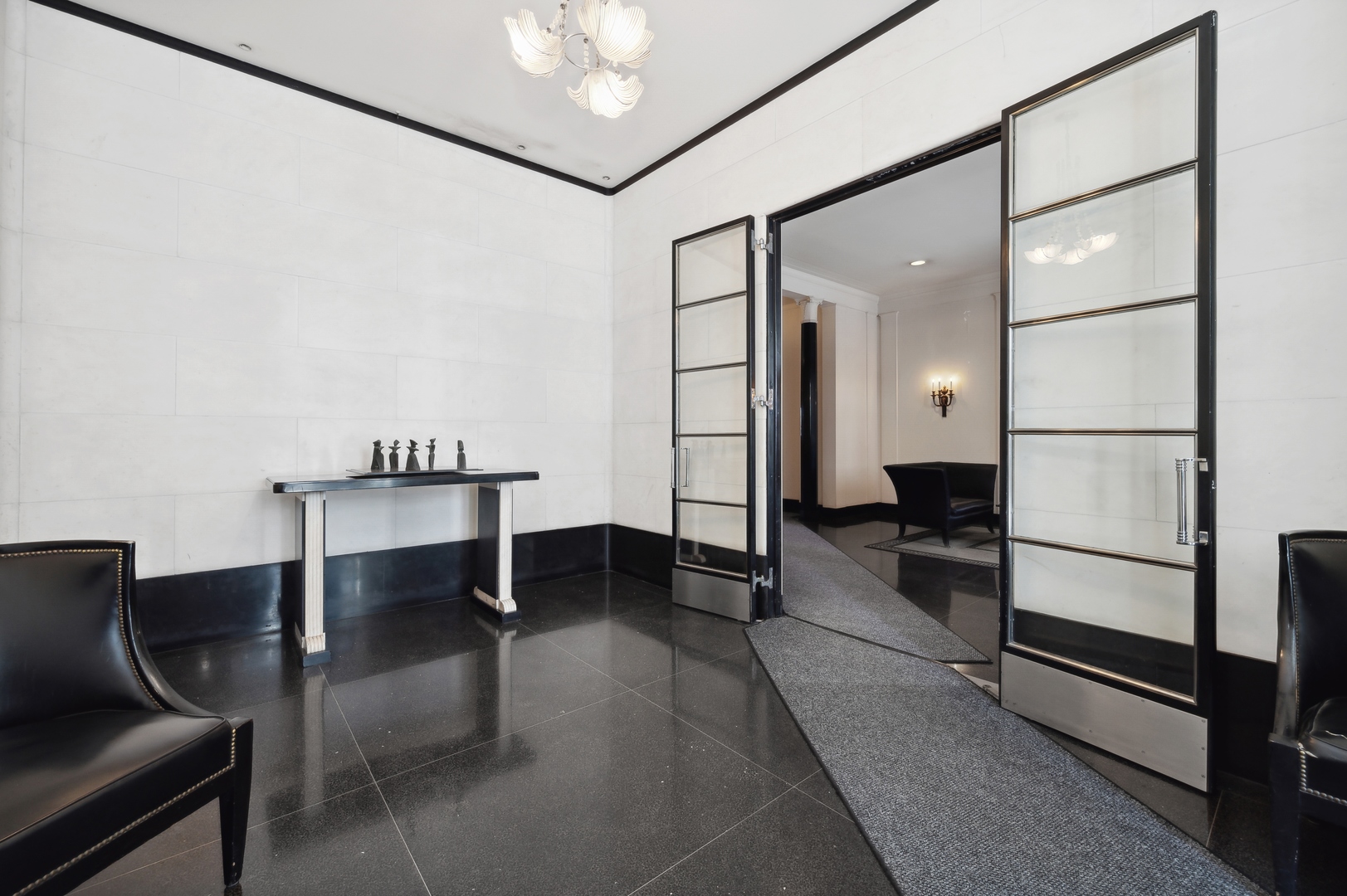 1260 North Astor Street, Unit 8 Chicago, IL 60610 - Photo 3 of 27 a living room with furniture