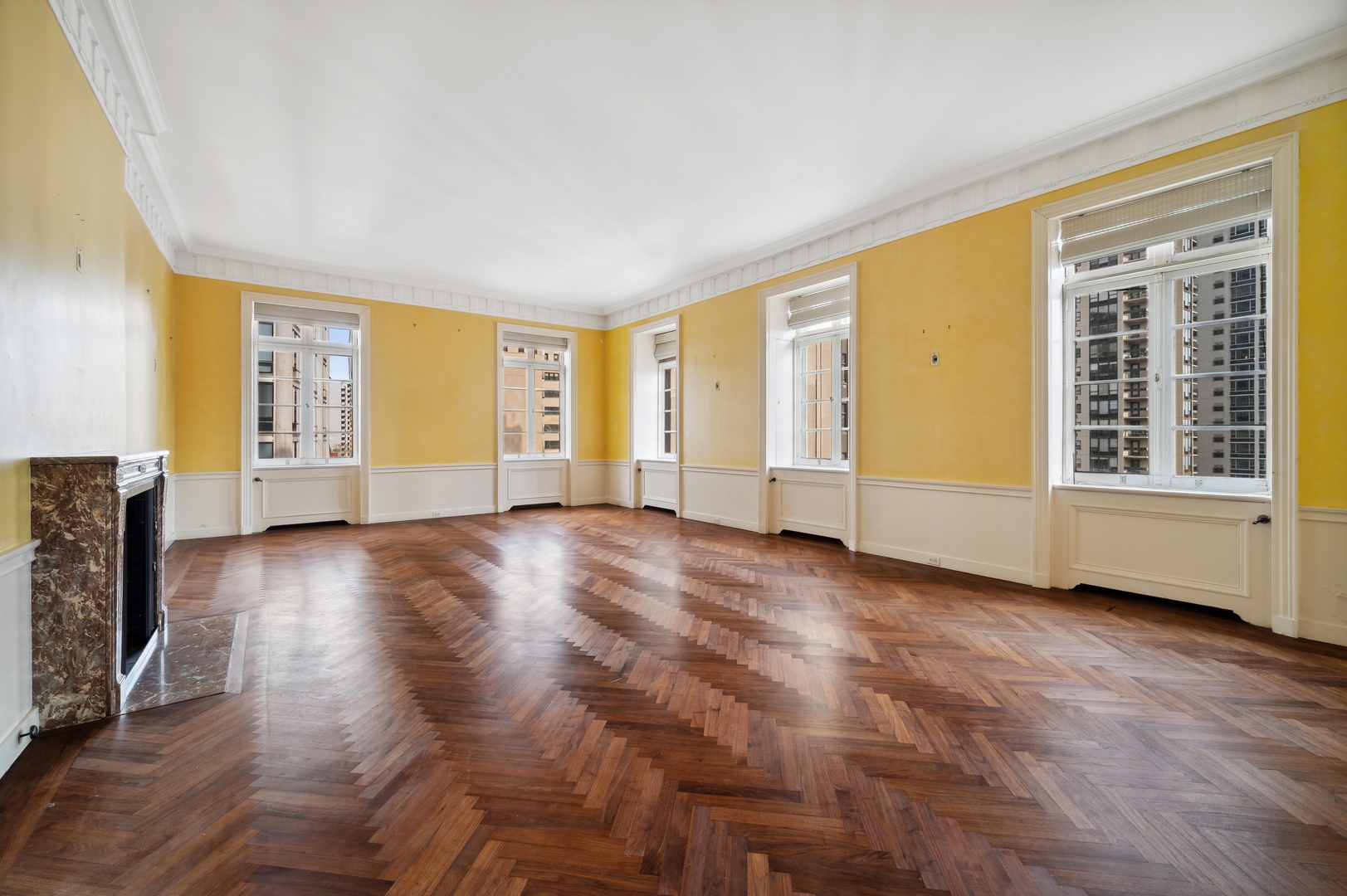 1260 North Astor Street, Unit 8 Chicago, IL 60610 - Photo 7 of 27 a view of an empty room with a window and wooden floor