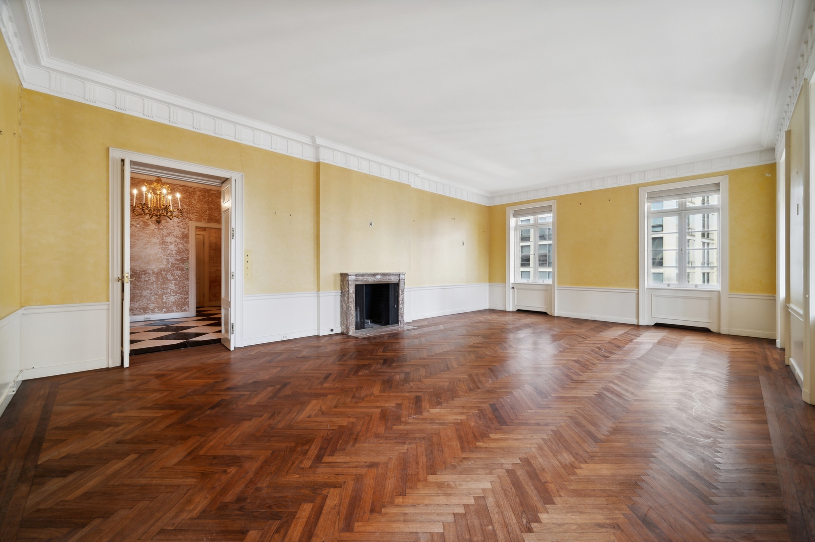 1260 North Astor Street, Unit 8 Chicago, IL 60610 - Photo 8 of 27 an empty room with windows and fireplace