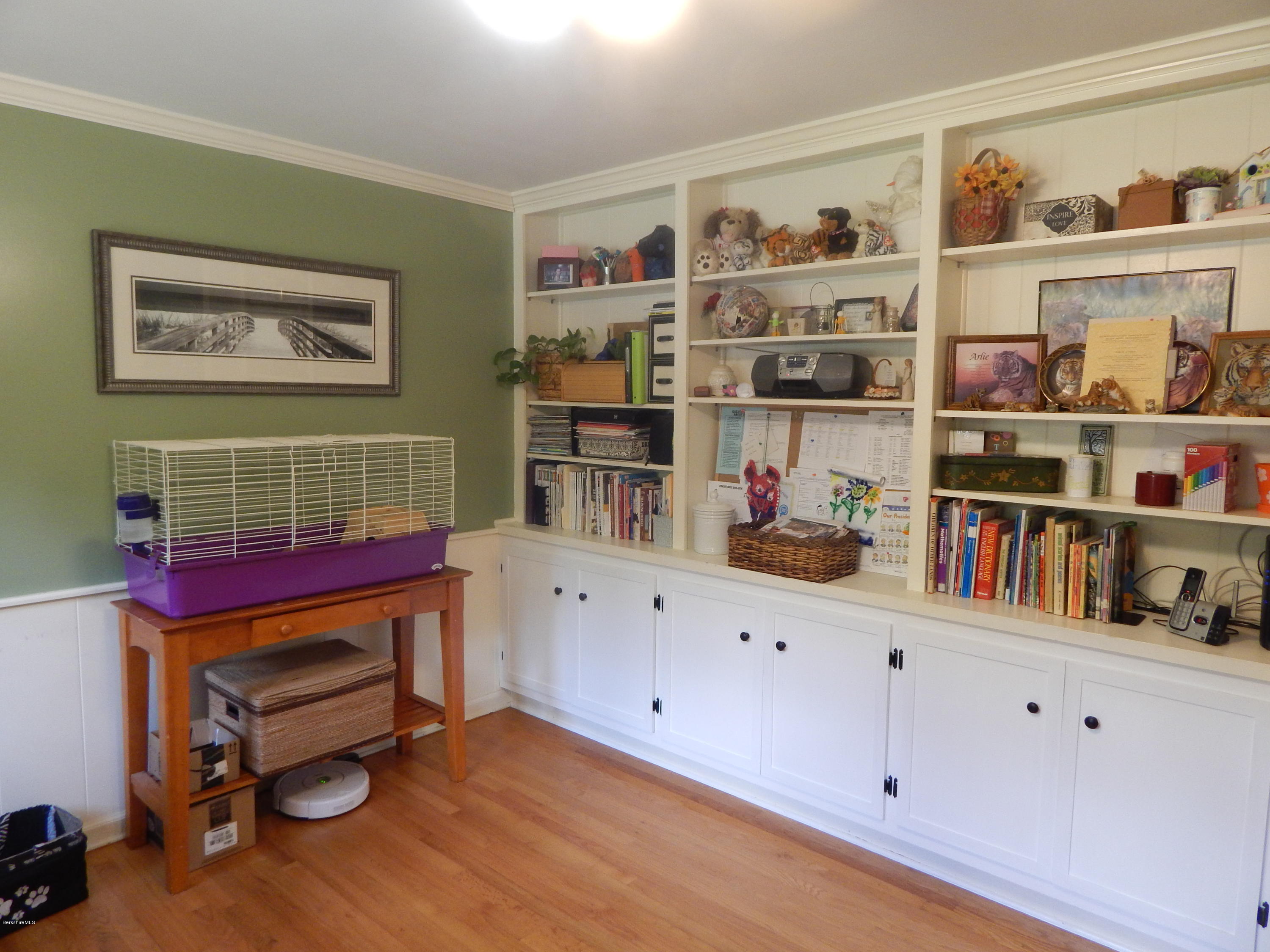 425 Devon Road Lee, MA 01238 - Photo 23 of 35 a room with furniture and a book shelf