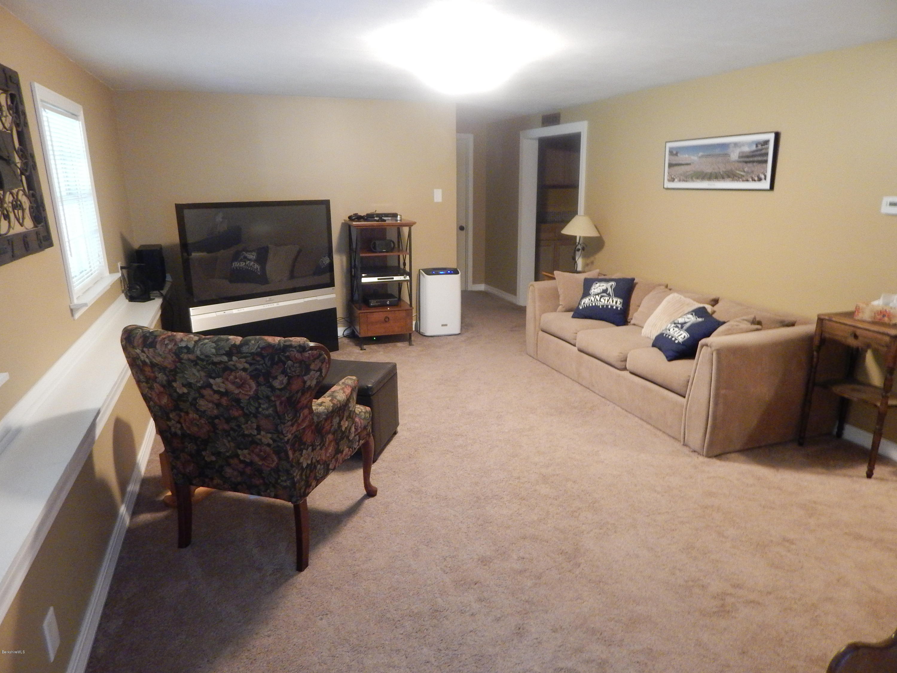 425 Devon Road Lee, MA 01238 - Photo 26 of 35 a living room with furniture and a flat screen tv