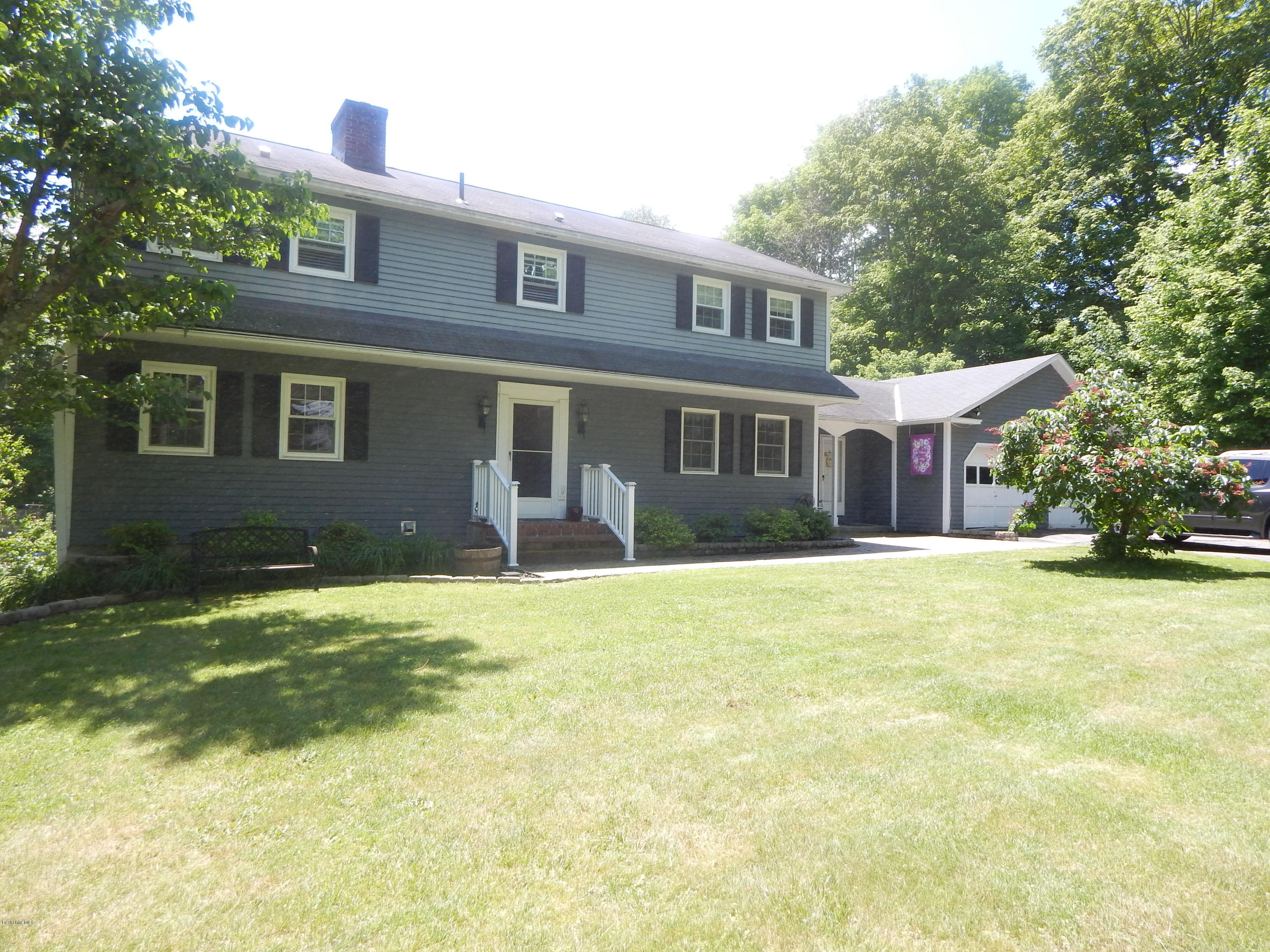425 Devon Road Lee, MA 01238 - Photo 35 of 35 a house view with swimming pool in front of it