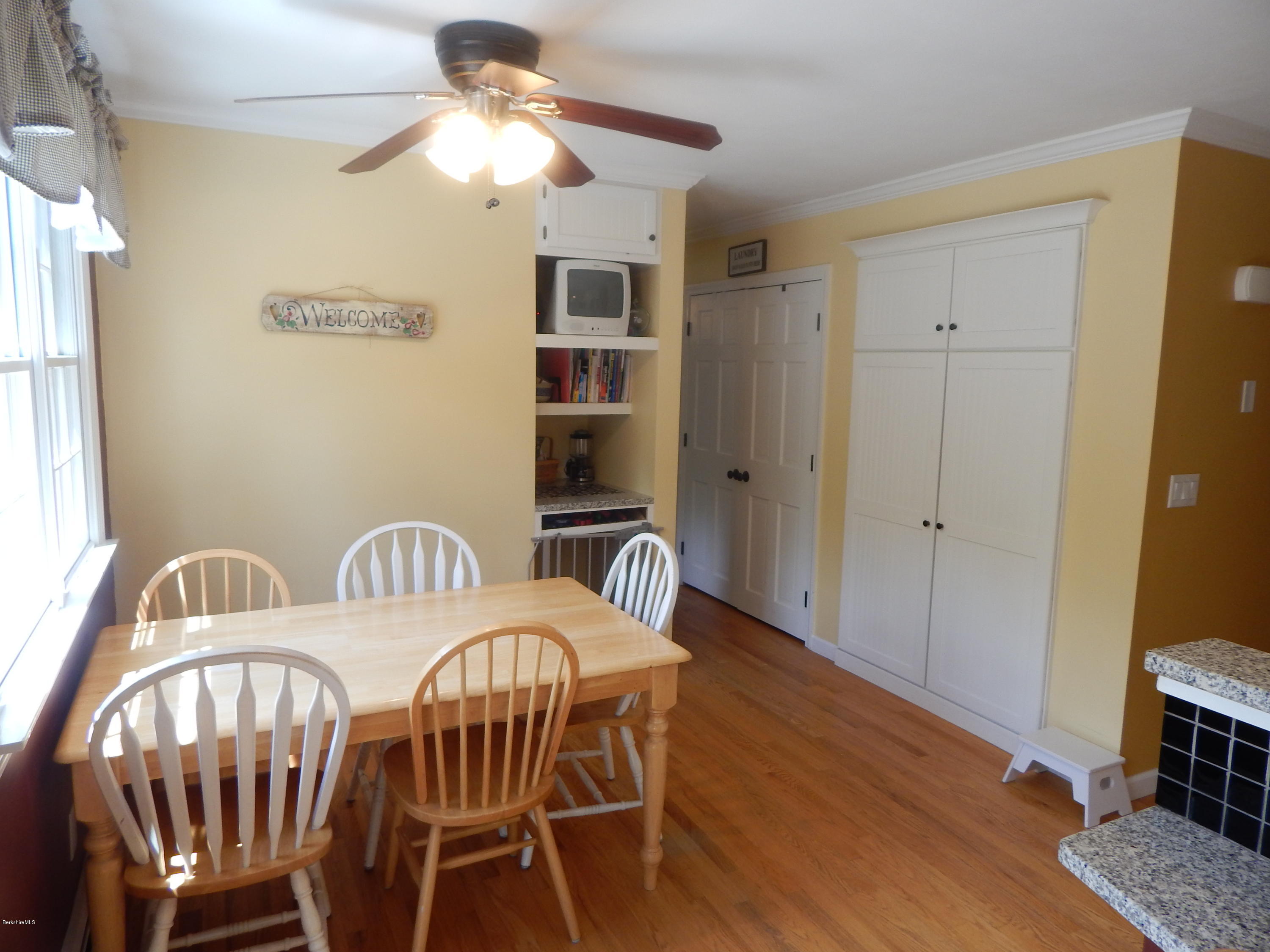 425 Devon Road Lee, MA 01238 - Photo 6 of 35 a view of a dining room with furniture