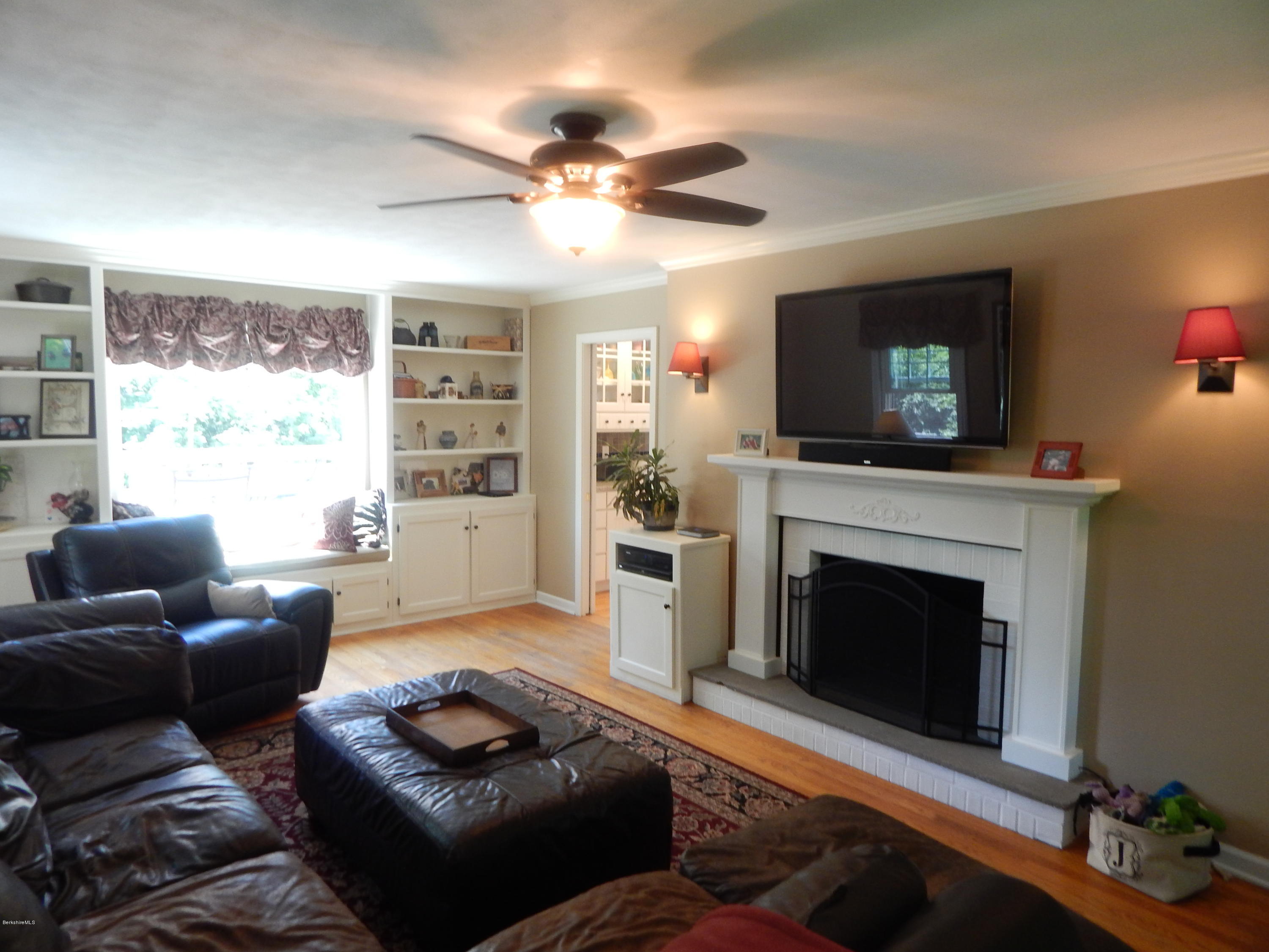 425 Devon Road Lee, MA 01238 - Photo 7 of 35 a living room with furniture and a fireplace