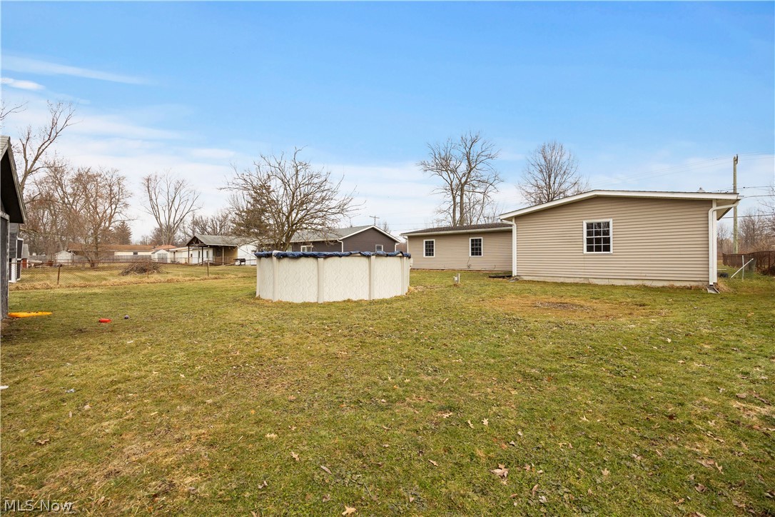 12452 Island Road Grafton, OH 44044 - Photo 31 of 39 View of yard with an outdoor pool