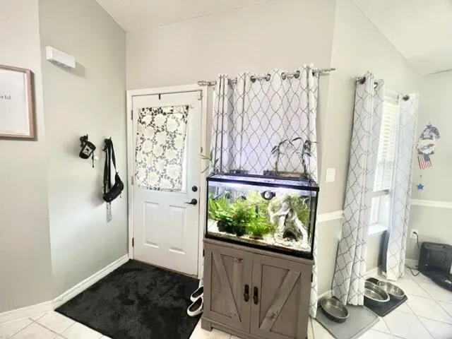 a view of entryway with wooden floor