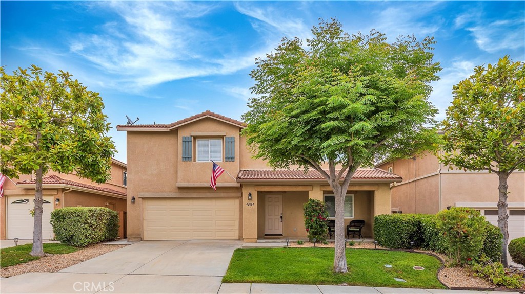42064 Pine Needle Street Temecula, CA 92591 - Photo 1 of 39 a house view with a garden space