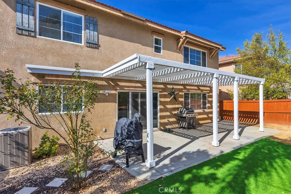 42064 Pine Needle Street Temecula, CA 92591 - Photo 27 of 39 a view of a house with backyard and porch