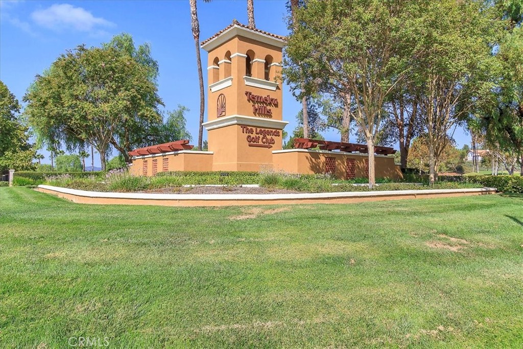 42064 Pine Needle Street Temecula, CA 92591 - Photo 34 of 39 a view of a house with a yard