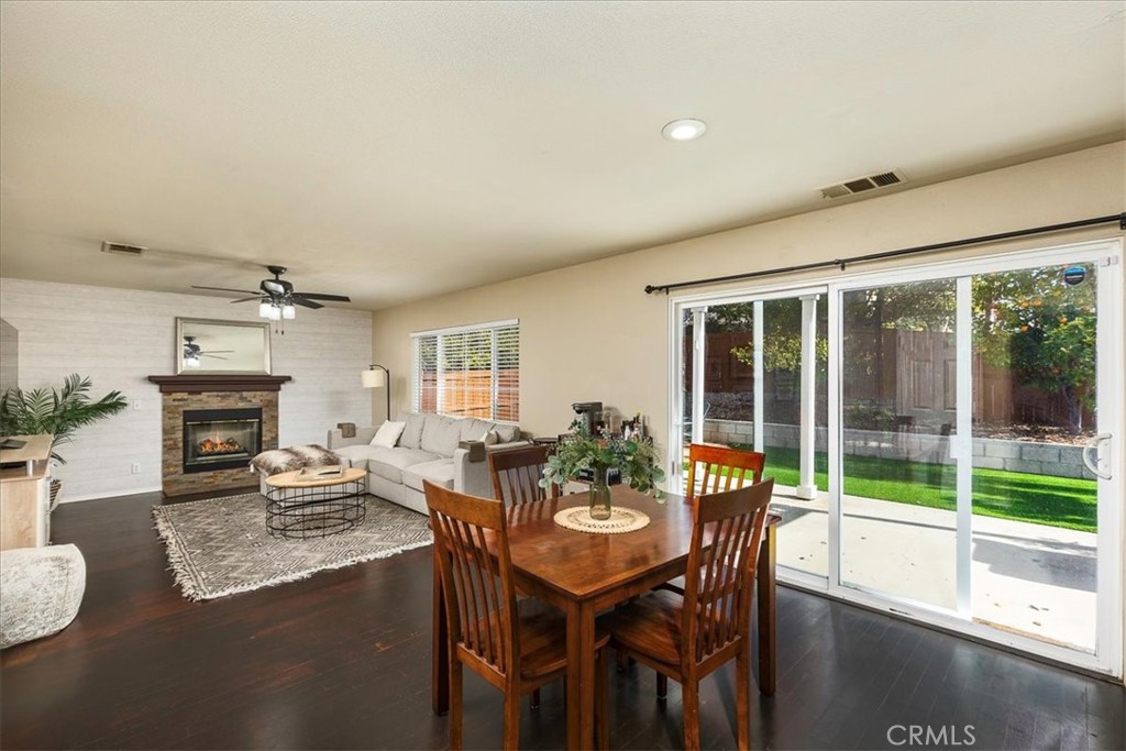 42064 Pine Needle Street Temecula, CA 92591 - Photo 9 of 39 a view of a dining room with furniture window and outside view