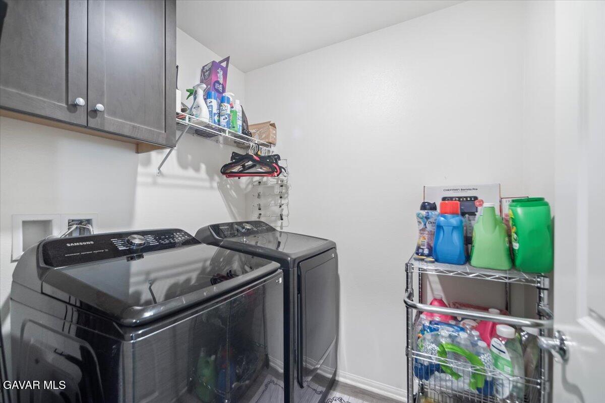 44304 43rd Street West Lancaster, CA 93536 - Photo 14 of 37 a utility room with dryer and washer
