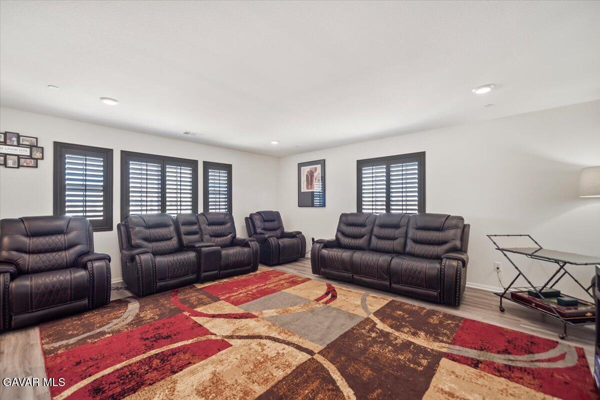 44304 43rd Street West Lancaster, CA 93536 - Photo 23 of 37 a living room with furniture and a window