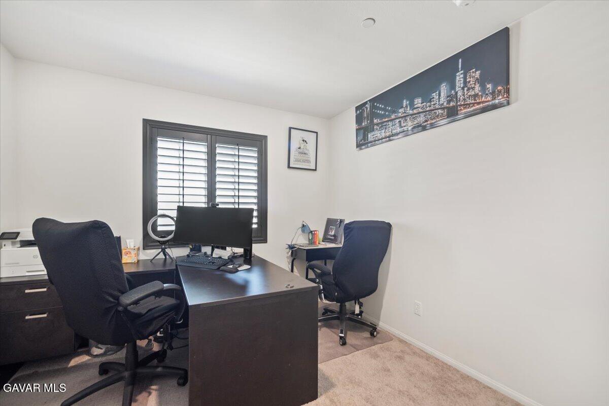44304 43rd Street West Lancaster, CA 93536 - Photo 27 of 37 a work room with furniture and windows