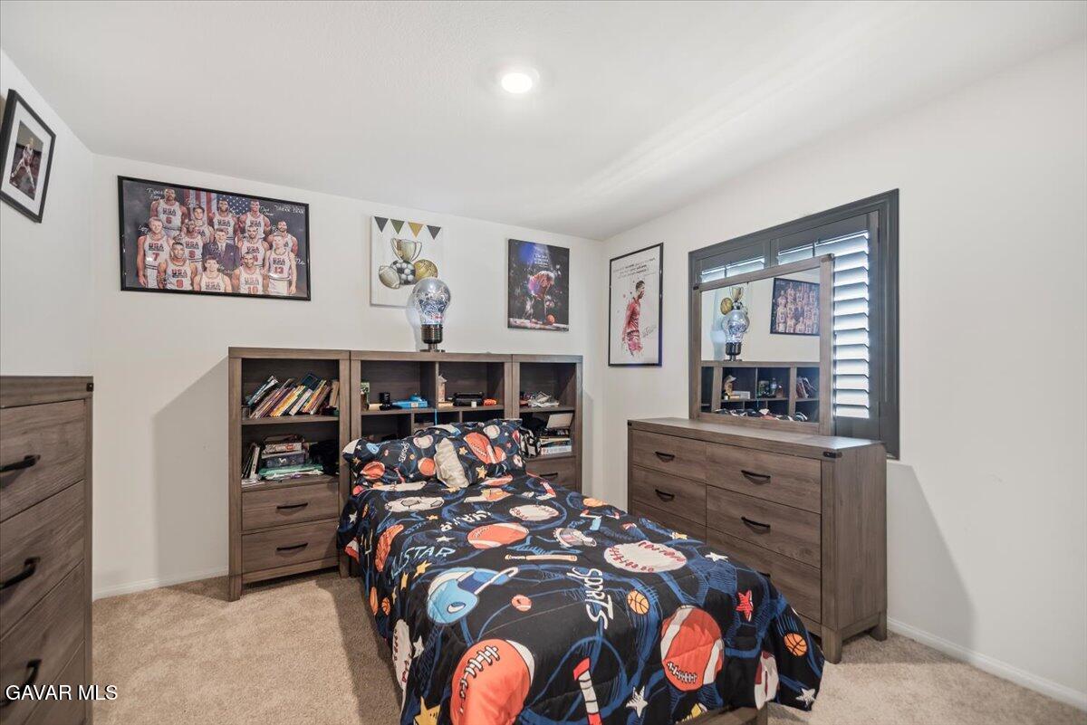 44304 43rd Street West Lancaster, CA 93536 - Photo 30 of 37 a bed room with furniture and decor