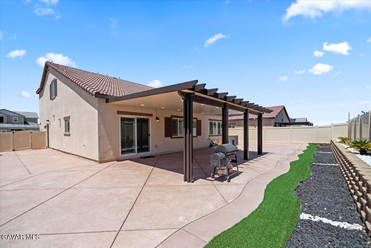 44304 43rd Street West Lancaster, CA 93536 - Photo 37 of 37 a view of a house with backyard and sitting area
