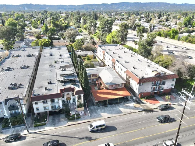 an aerial view of a city with streets