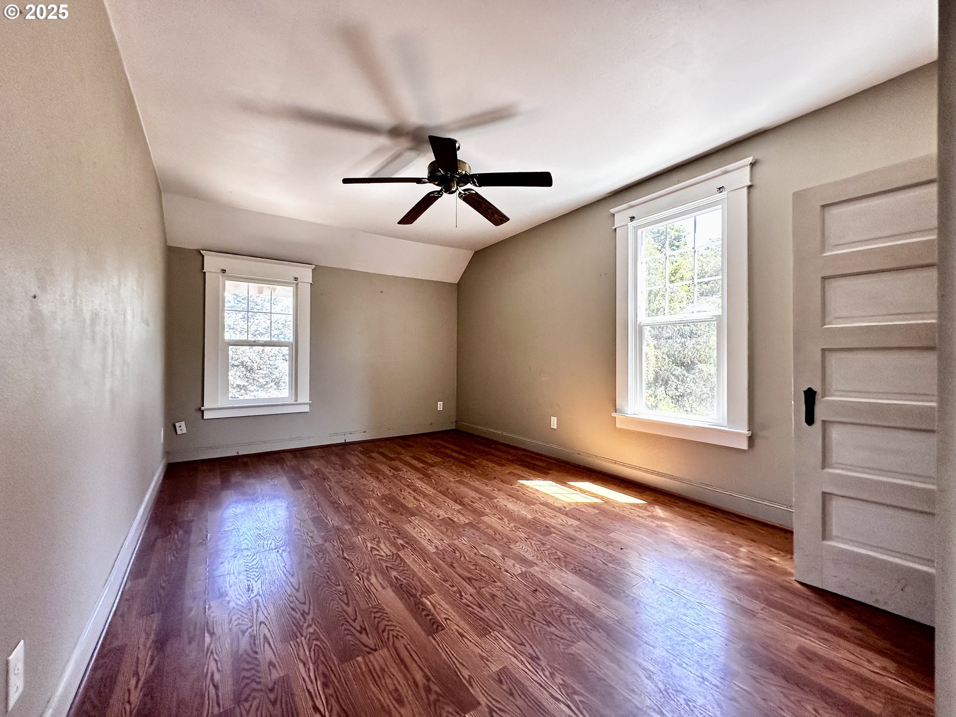 2453 Highway 20 Albany, OR 97321 - Photo 21 of 47 a view of empty room with wooden floor and fan