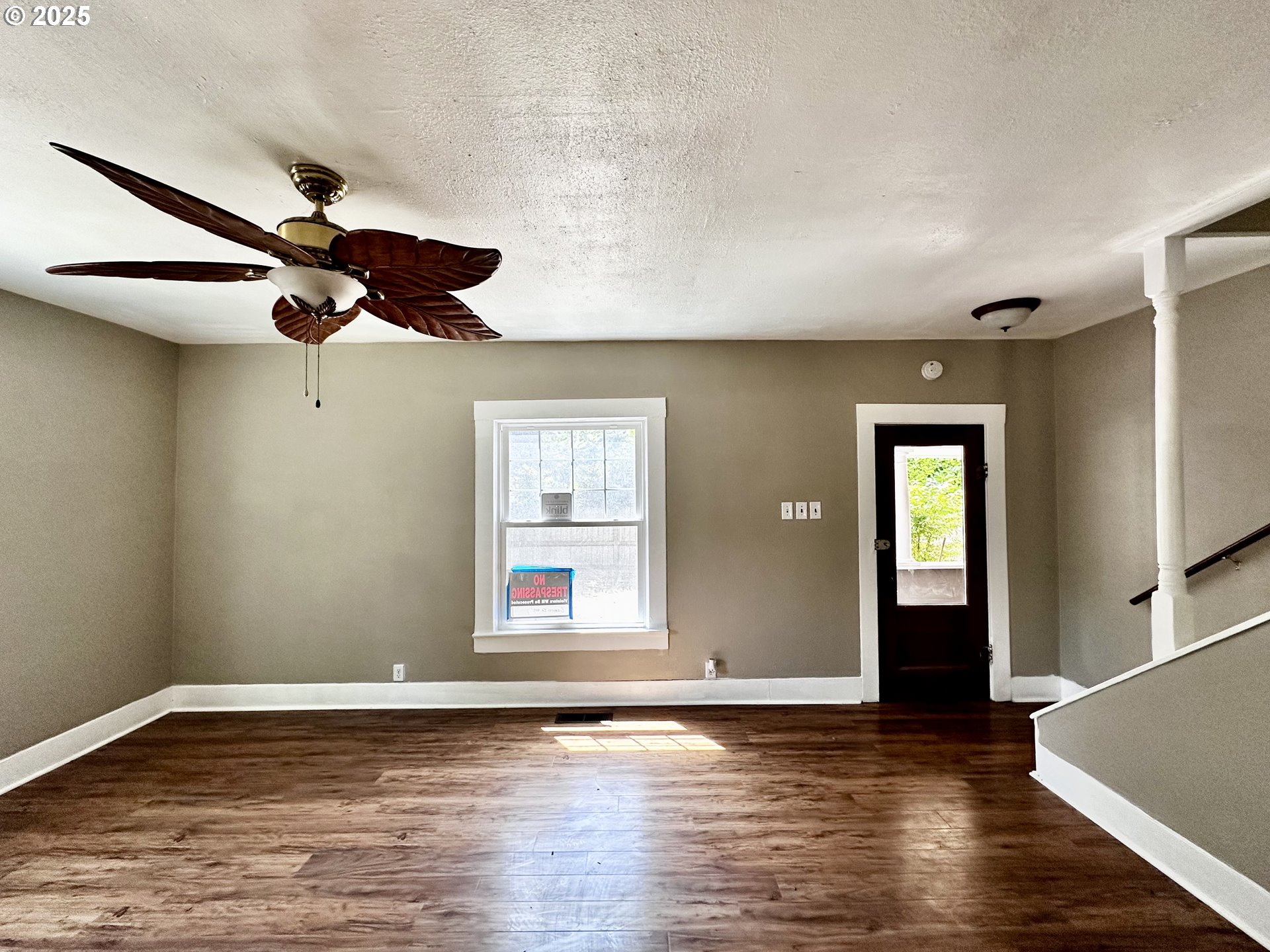 2453 Highway 20 Albany, OR 97321 - Photo 7 of 47 a view of an empty room with wooden floor and a window