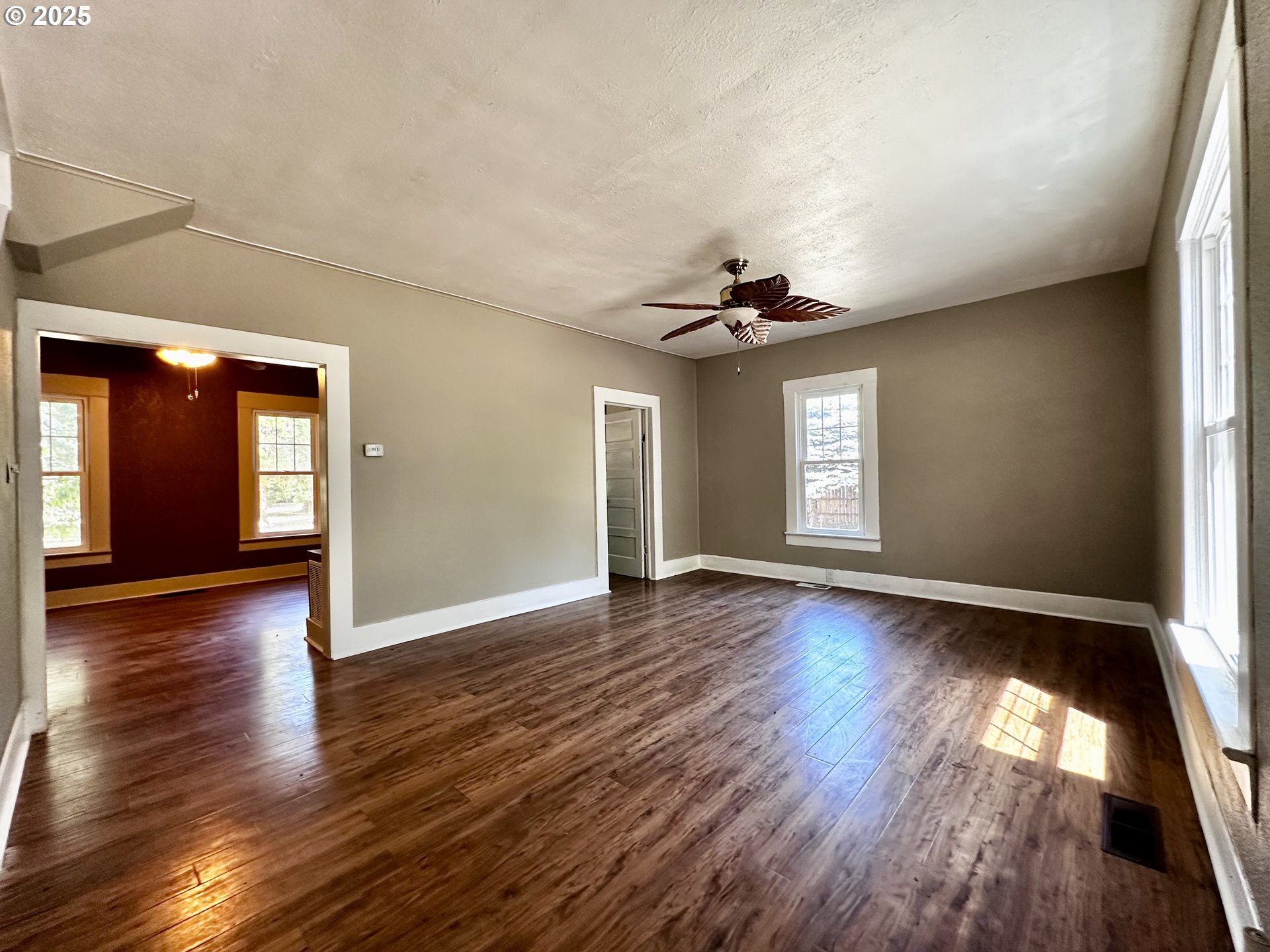 2453 Highway 20 Albany, OR 97321 - Photo 10 of 47 a view of an empty room with wooden floor and a window