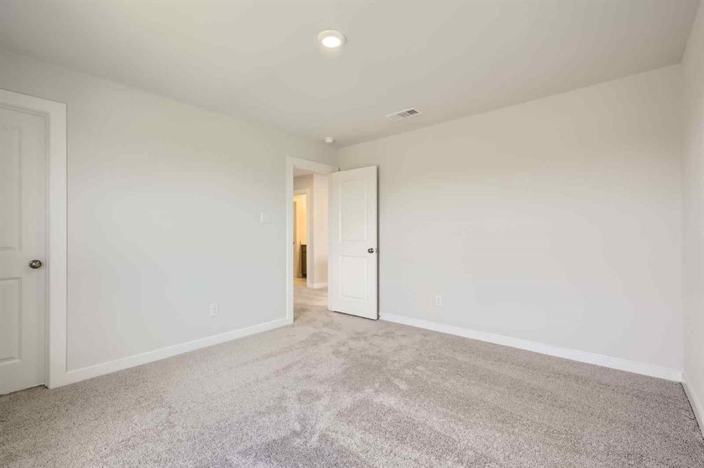 694 Cari Lane Forney, TX 75126 - Photo 21 of 40 a view of an empty room