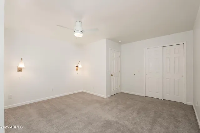 an aerial view of residential houses with outdoor space and river