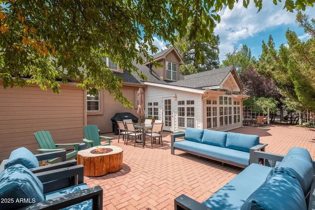 a view of a town with mountains in the background
