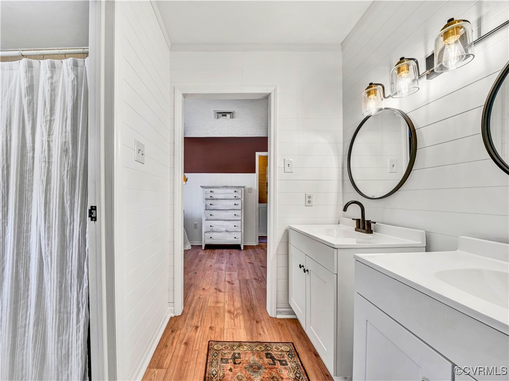 2632 Paisley Road Gretna, VA 24557 - Photo 17 of 49 a bathroom with a sink and a mirror