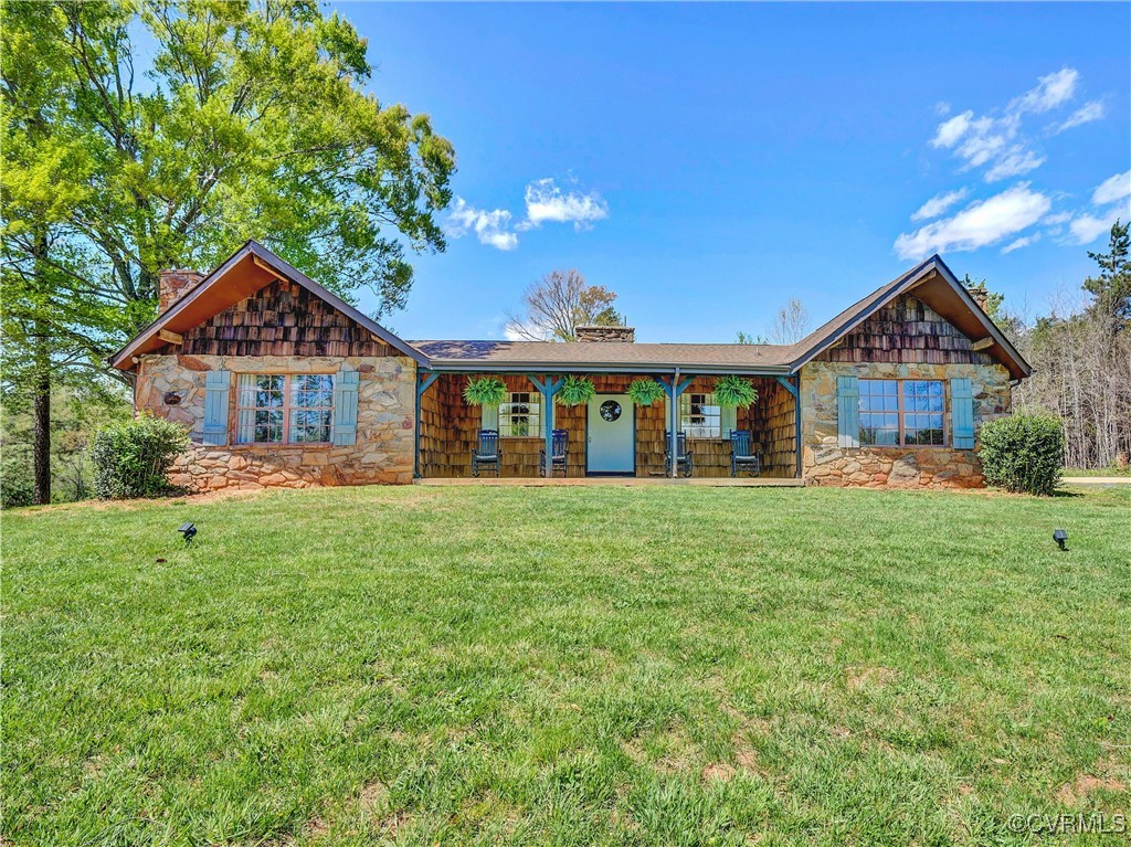 2632 Paisley Road Gretna, VA 24557 - Photo 2 of 49 a front view of a house with a yard