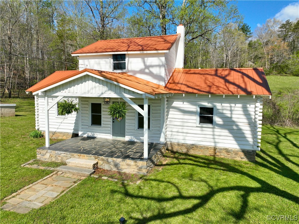2632 Paisley Road Gretna, VA 24557 - Photo 24 of 49 a view of a house with backyard and sitting area