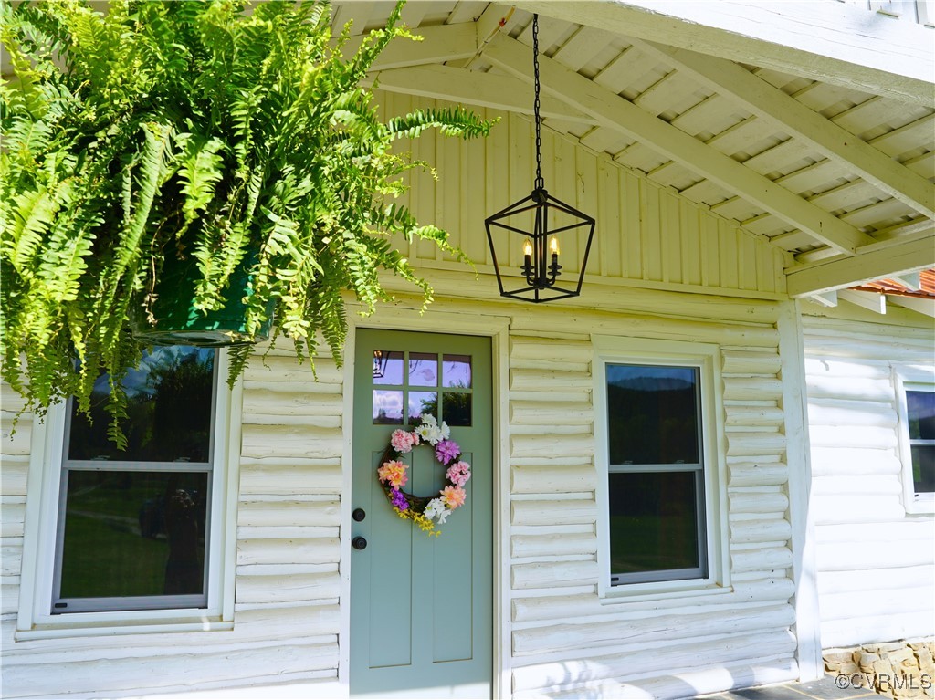 2632 Paisley Road Gretna, VA 24557 - Photo 26 of 49 a front view of a building with a tree