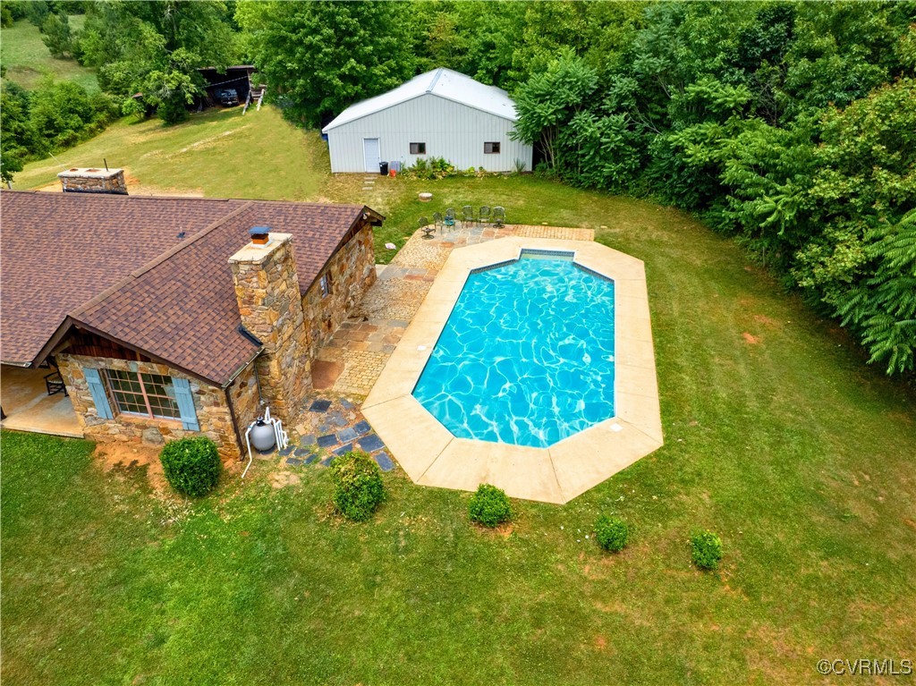 2632 Paisley Road Gretna, VA 24557 - Photo 3 of 49 an aerial view of a house with swimming pool and trees in the background