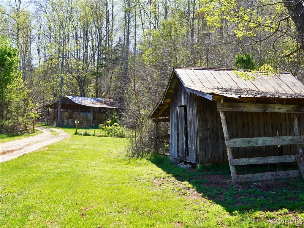 2632 Paisley Road Gretna, VA 24557 - Photo 35 of 49 a view of a house with backyard and wooden fence