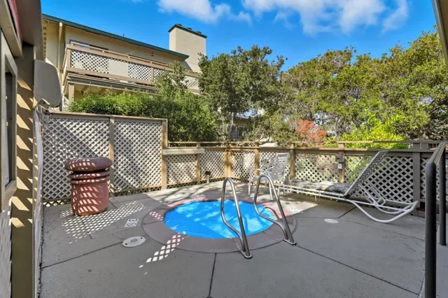 a view of a terrace with furniture