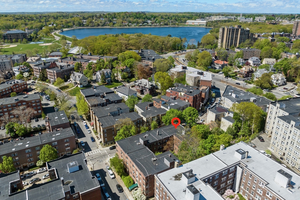 97 Strathmore Road, Unit 1 Boston, MA 02135 - Photo 14 of 16 an aerial view of residential building with outdoor space and lake view